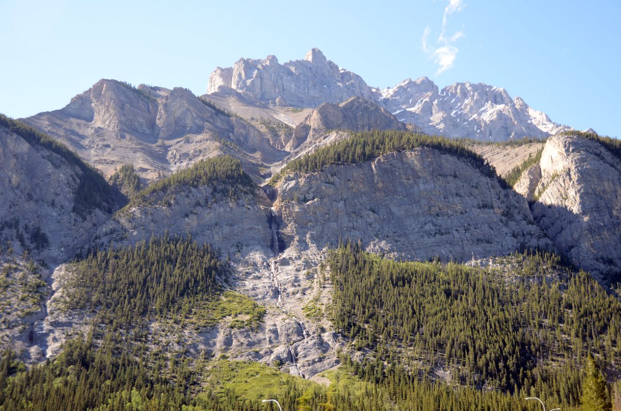 28B Cascade Mountain was named in 1858 by James Hector after the waterfall or cascade on the southern flanks of the peak - From Trans Canada Highway Just Before Banff In Summer